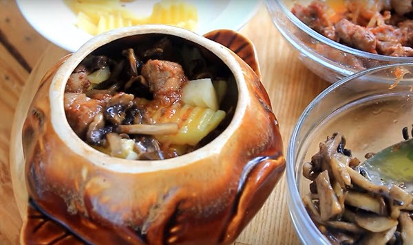 Pork with vegetables baked in a pot