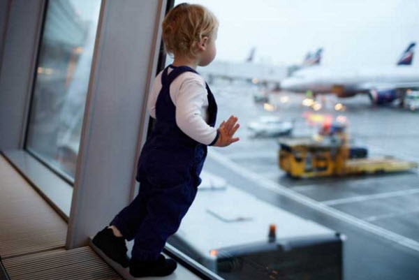 How do I buy a plane ticket for my child?