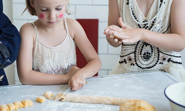 How to teach a child to help in the kitchen?